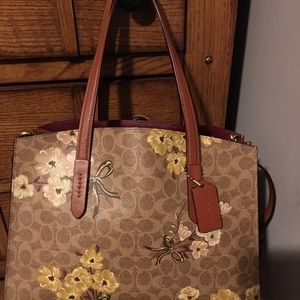 Coach Charlie Carryall